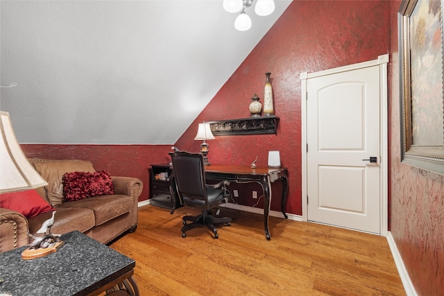 102 Ridge Ct, Glen Rose, TX 76043 - office area featuring light wood-type flooring, vaulted ceiling, baseboards, and a textured wall