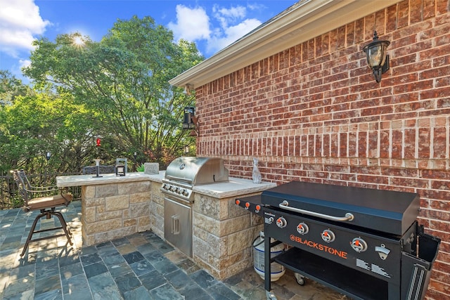 102 Ridge Ct, Glen Rose, TX 76043 - view of patio with area for grilling and exterior bar