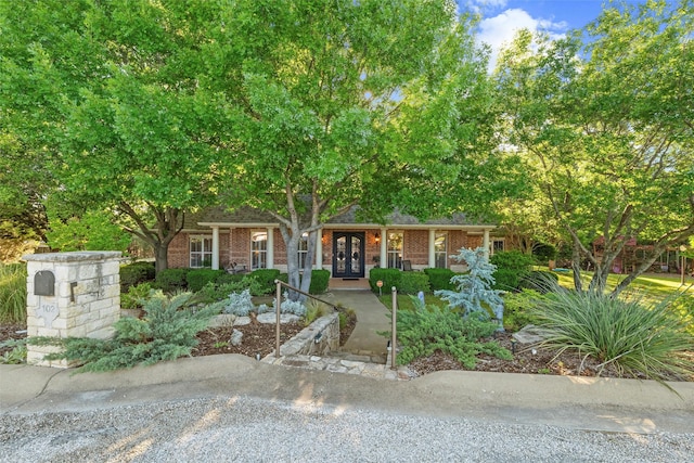 102 Ridge Ct, Glen Rose, TX 76043 - view of front of house with french doors and brick siding