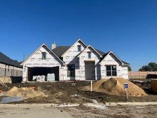 property in mid-construction featuring a garage