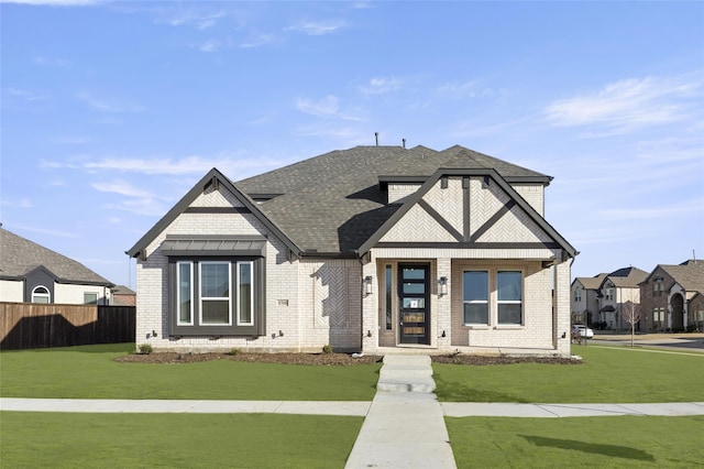 view of front of home featuring a front yard