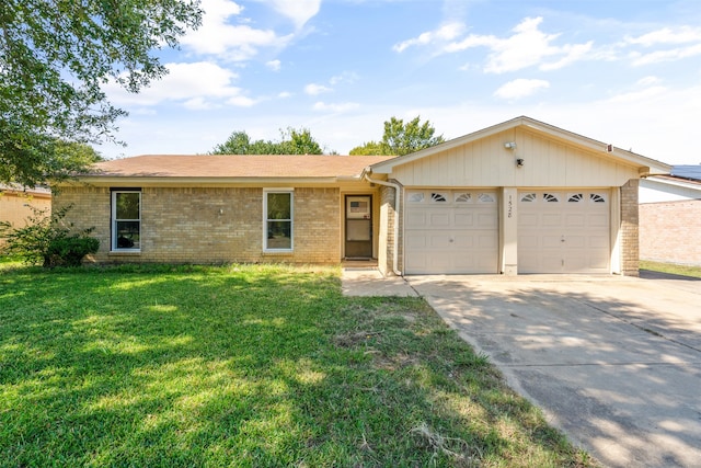 single story home with a front yard and a garage