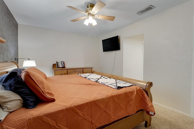 bedroom featuring ceiling fan and carpet floors