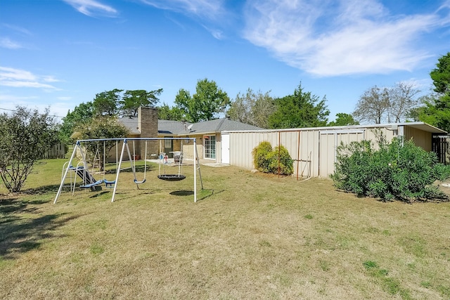 view of yard with a playground