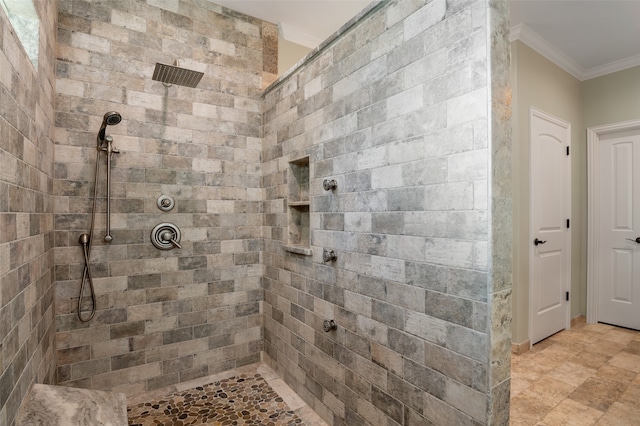 bathroom featuring tiled shower and ornamental molding