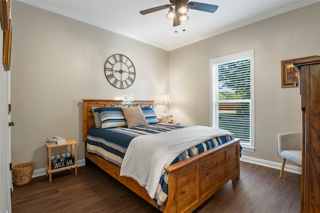 bedroom with ceiling fan, dark hardwood / wood-style flooring, and crown molding