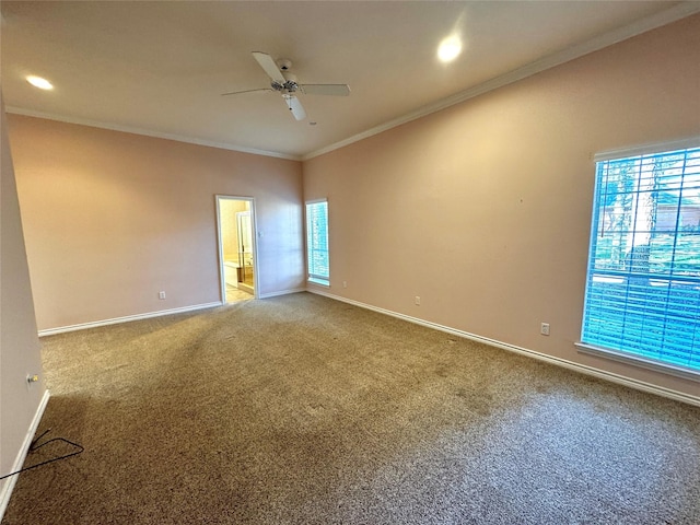 carpeted empty room featuring a ceiling fan, baseboards, recessed lighting, and crown molding