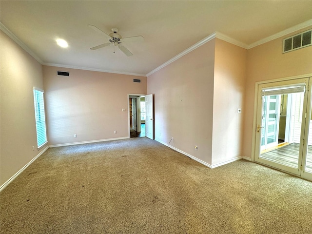 unfurnished room featuring a ceiling fan, visible vents, and carpet floors