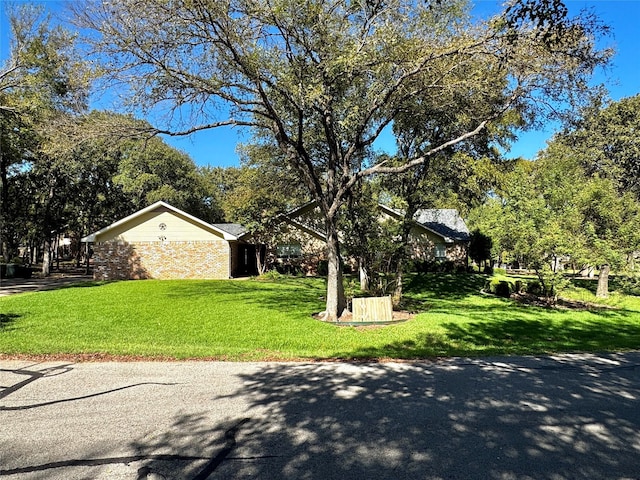 exterior space with a front lawn