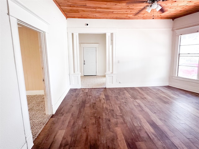 unfurnished room featuring ceiling fan, wooden ceiling, and hardwood / wood-style floors