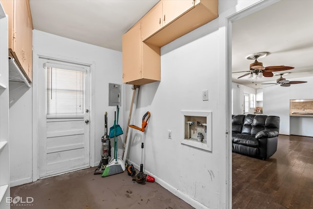 interior space with ceiling fan, cream cabinets, dark hardwood / wood-style floors, and a healthy amount of sunlight