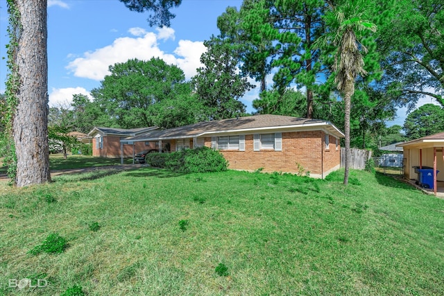 exterior space with a front lawn