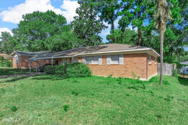 back of house with a yard