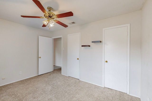 13818 Methuen Green Ln, Dallas, TX 75240 - unfurnished bedroom with carpet floors, a ceiling fan, and visible vents
