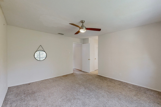 13818 Methuen Green Ln, Dallas, TX 75240 - spare room featuring ceiling fan, light carpet, visible vents, and baseboards