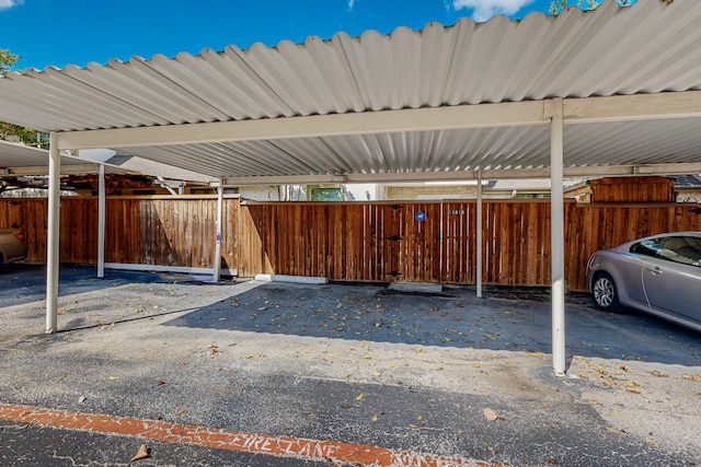 13818 Methuen Green Ln, Dallas, TX 75240 - covered parking lot with fence