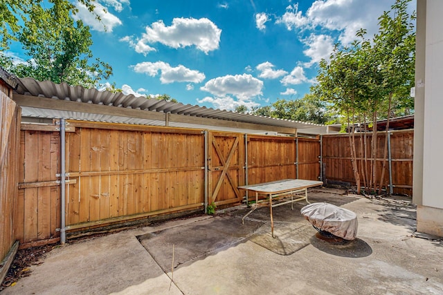 13818 Methuen Green Ln, Dallas, TX 75240 - view of patio featuring a gate and a fenced backyard