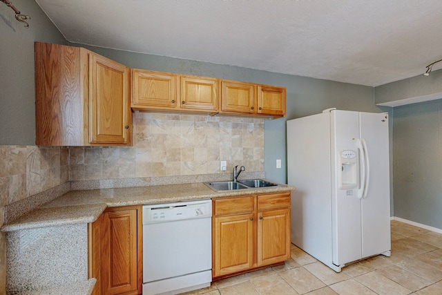 13818 Methuen Green Ln, Dallas, TX 75240 - kitchen featuring backsplash, a sink, white appliances, and light countertops