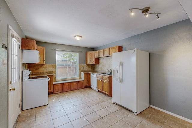 13818 Methuen Green Ln, Dallas, TX 75240 - kitchen featuring a sink, light tile patterned flooring, decorative backsplash, white appliances, and light countertops