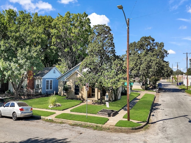 view of front of property with a front lawn