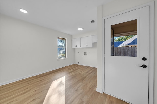 interior space with light hardwood / wood-style flooring