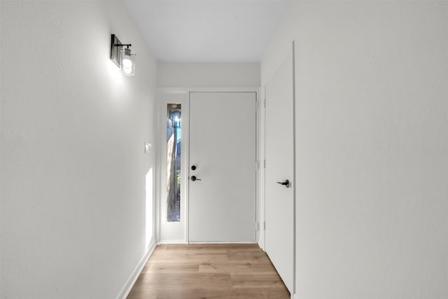 doorway featuring light wood-type flooring