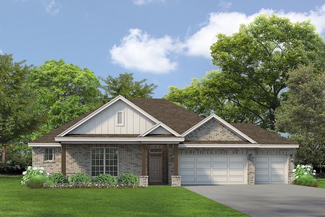 view of front of property with a garage and a front lawn