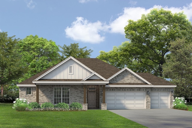 view of front of property featuring a garage and a front yard