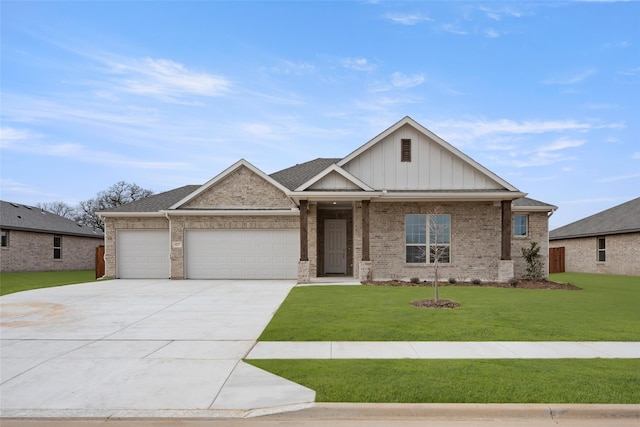 craftsman inspired home featuring a garage and a front lawn