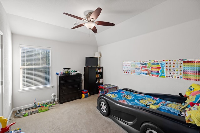 carpeted bedroom with a ceiling fan and baseboards