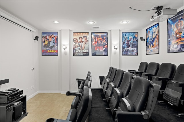 carpeted cinema room featuring recessed lighting, visible vents, and baseboards