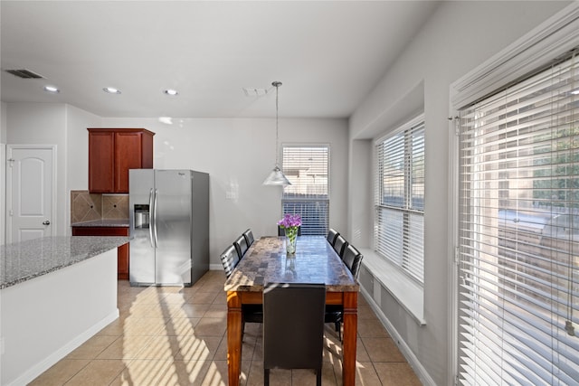 dining space featuring light tile patterned floors, visible vents, recessed lighting, and baseboards