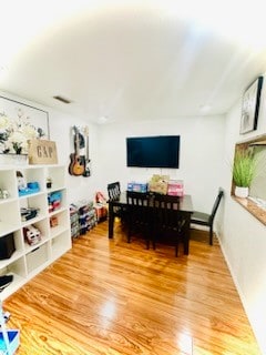 game room featuring hardwood / wood-style flooring