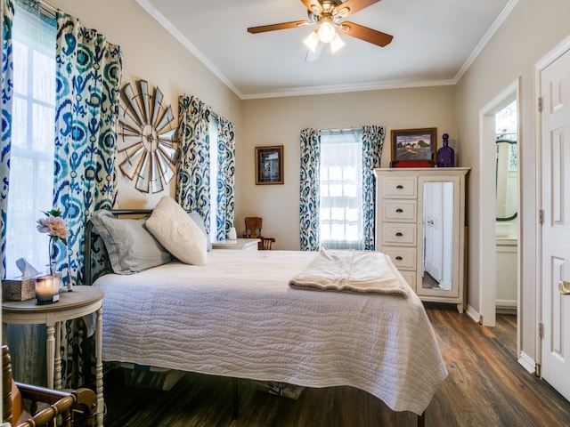 bedroom with ornamental molding, ceiling fan, and dark hardwood / wood-style flooring