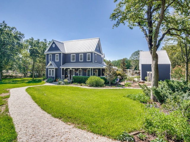 view of front of home featuring a front yard