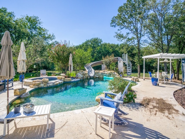 view of swimming pool featuring a patio, an in ground hot tub, and a pergola