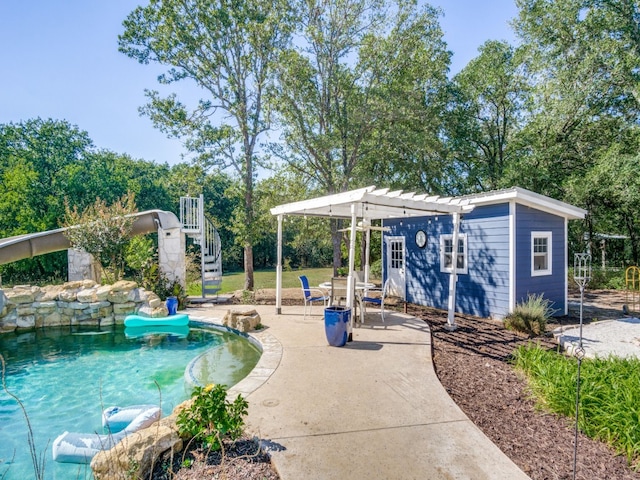 view of pool featuring a pergola and a patio area