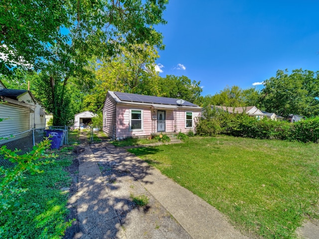 view of front of home with a front yard