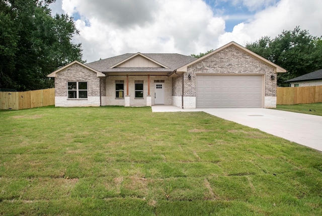 ranch-style house with a front yard and a garage