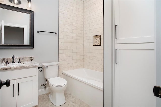 full bathroom featuring tile patterned floors, tiled shower / bath, vanity, and toilet