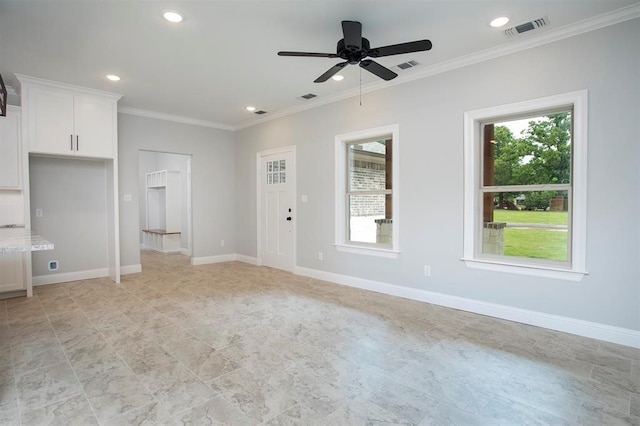 interior space featuring ornamental molding and ceiling fan