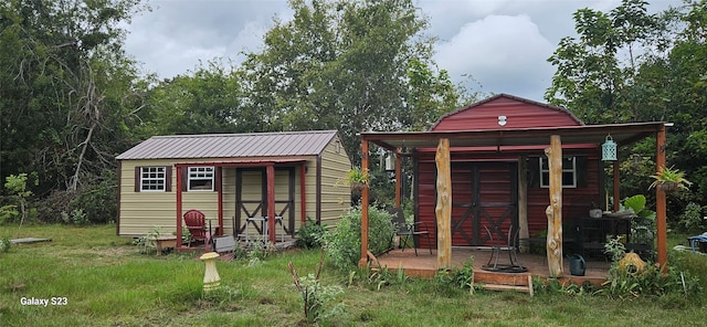 view of outbuilding featuring an outdoor structure