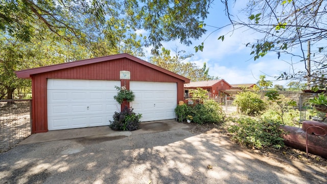 detached garage with fence