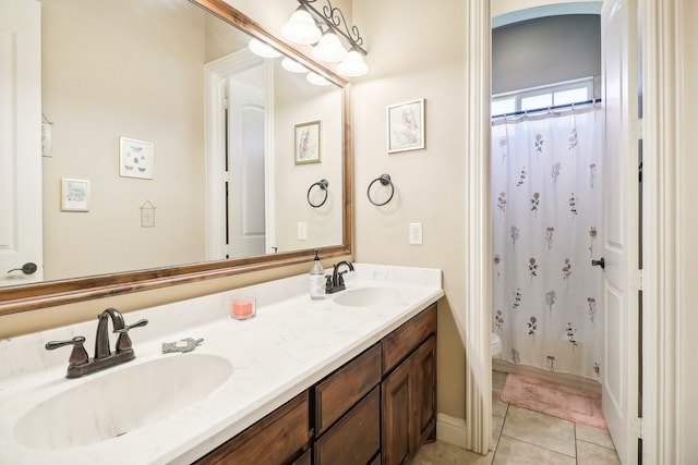 bathroom with walk in shower, vanity, toilet, and tile patterned floors