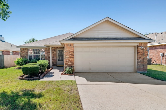 single story home featuring a front yard, cooling unit, and a garage