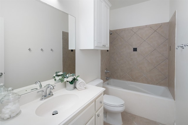 full bathroom with tile patterned flooring, tiled shower / bath combo, toilet, and vanity