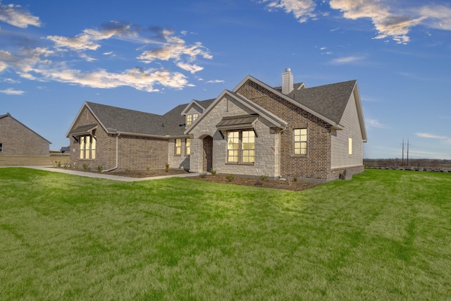 view of front of home with a front yard