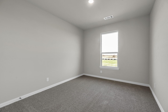 view of carpeted spare room