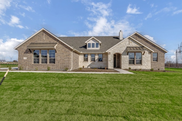 view of front of house with a front yard