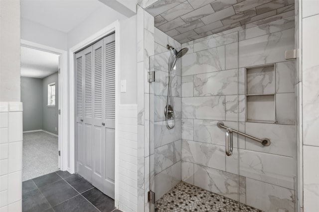 bathroom featuring tile patterned floors and walk in shower